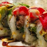 Tuna Heaven  · Shrimp tempura, cucumber, avocado, and crabmeat, topped with fresh tuna. spicy mayo, eel sau...