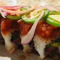 Yellowtail Special · Yellowtail, cucumber, avocado, and asparagus, topped with spicy tuna, red onion, jalapeno, a...