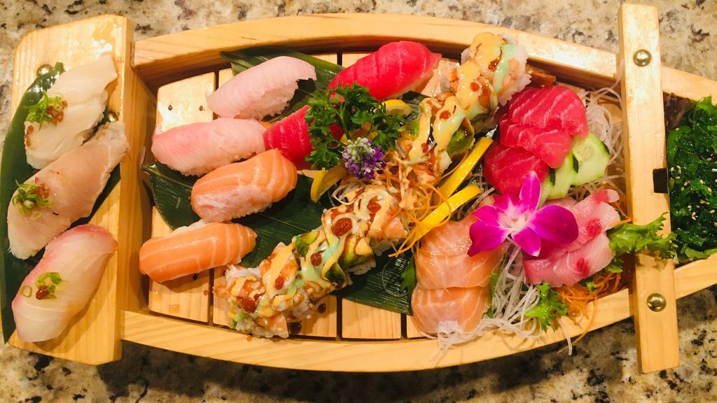 Captain'S Boat · Chef's choice of 9 pieces sashimi and 9 pieces sushi served with okey dokey roll, seaweed salad and miso or clear soup.