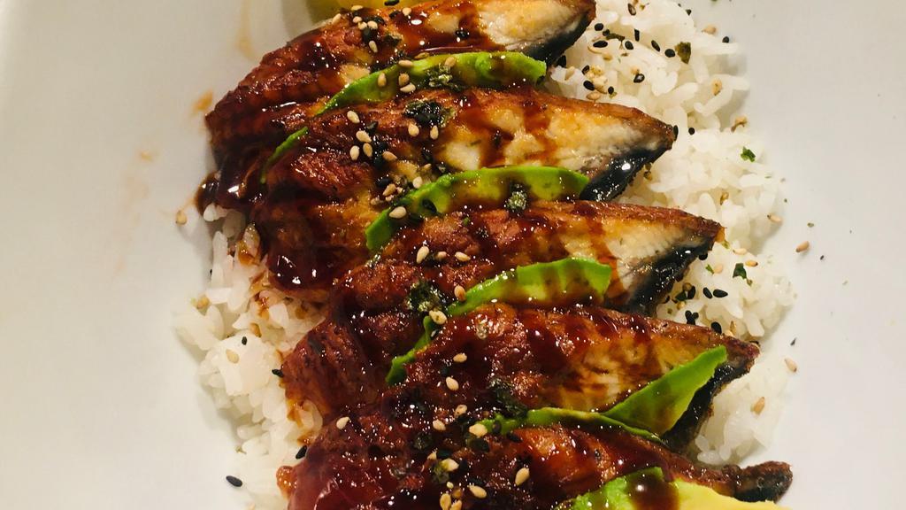 Unadon · A bowl of steamed rice topped with 6pcs of grilled unagi (eel) fillets are glazed with sweetened soy-based sauce.