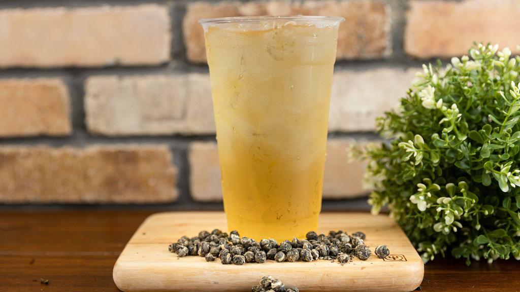 Thai Tea · Black Tea, Honeybush Tea, Apple Pieces, Cardamom, Coconut, Natural Vanilla Flavor, Safflower, Natural Coconut Flavor.