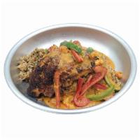 Catfish Atchafalaya · Blackened Catfish smothered in a crawfish cream sauce on a bed of Dirty Rice