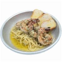 Shrimp Pasta · Grilled collassal shrimp with garlic butter linguini, parmesan, and served with a few crostini