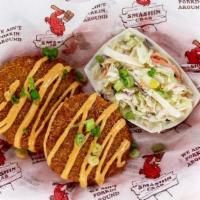Jumbo Lump Crab Cakes · Jumbo Lump Crab formed into two crispy cakes topped with remoulade and green onion