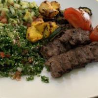 Combination Kabob · One skewer of kobideh, one skewer of chicken tender marinated in a special house recipe, coo...