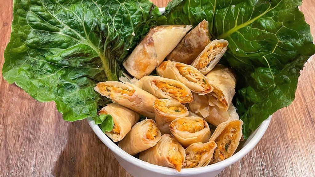 Lumpiang Shanghai · Filipino egg roll with pork, shrimp, and vegetable filling. Choice of size.