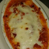 Lasagna · Beef, mozzarella, and ricotta cheese.