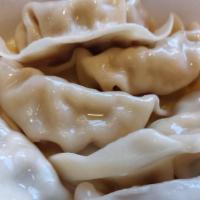 Chicken Dumplings (6) · Steamed, served with our homemade dumpling soy sauce.