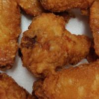 Golden Fried Chicken Wings (6) · Marinated chicken wings deep fried for ten minutes.