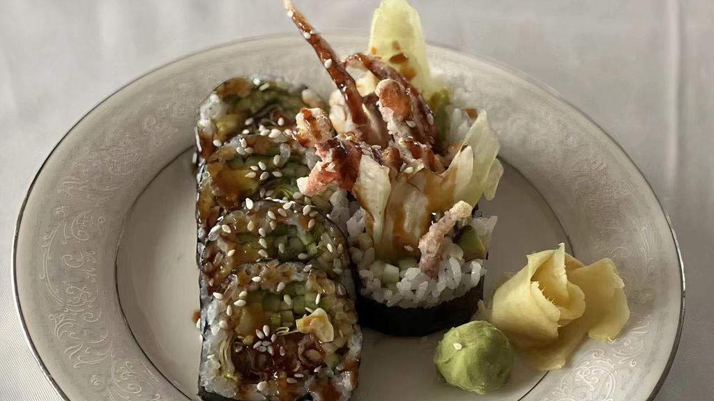  Spider Roll · Soft-shell crab, avocado, cucumber, lettuce, topped with eel sauce.