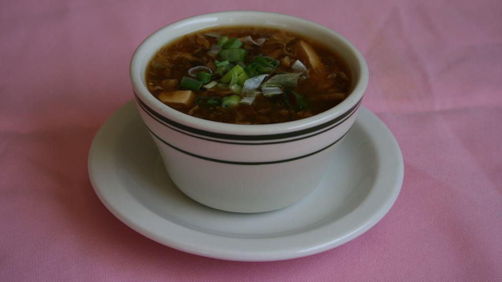 Hot & Sour Soup · Chicken and bean curd with hot white pepper and vinegar.