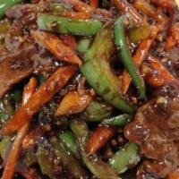 Szechuan Beef · Hot and spicy. Beef with shredded pepper and carrots in spicy szechuan sauce.