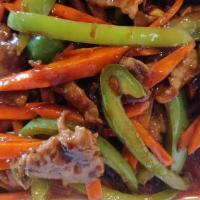 Szechuan Pork · Hot and spicy. Pork with shredded pepper and carrots in spicy szechuan sauce.