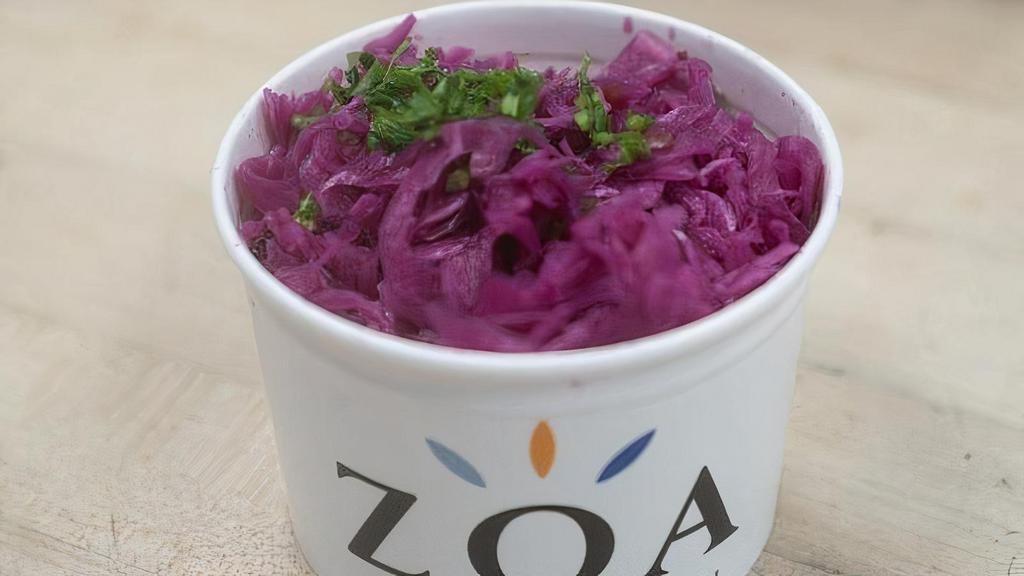 Pickled Red Onions Cabbage · Red onion, red cabbage, red wine vinegar, and cilantro parsley.