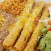 Flauta Plate · 5 Chicken Flautas topped with Lettuce, Tomato, Onion and Sour Cream. Side of Rice and Beans.
