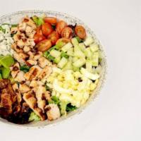 Village Cobb · Romaine lettuce, Grilled Chicken, Cucumbers, Grape Tomatoes, Chopped Egg, Bacon, Avocado, Bl...