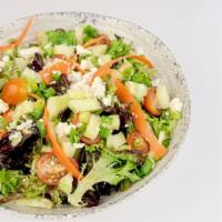 House Salad · Mixed greens, cucumbers, carrots, tomato, scallions, feta cheese, serve with our house vinai...