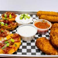Fried Cheese Sticks · Mozzarella cheese sticks lightly breaded and fried. Served with marinara sauce or ranch dres...