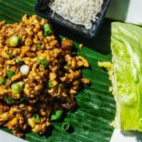 Chicken Or Tofu Lettuce Wrap · Minced chicken or tofu, water chestnuts, mushrooms, scallions, crispy noodles and cool lettu...
