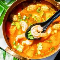 Classic Tom Yum  · Spicy. Spicy lemongrass soup with mushroom, cilantro, lime juice and chili.