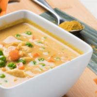 Yellow Curry · Spicy. Curry with aroma of cardamom, cinnamon, and turmeric in coconut milk with peas and ca...
