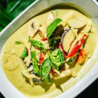 Green Curry · Spicy. Curry with green chili aroma, bamboo shoots, eggplant, basil, and bell pepper in coco...