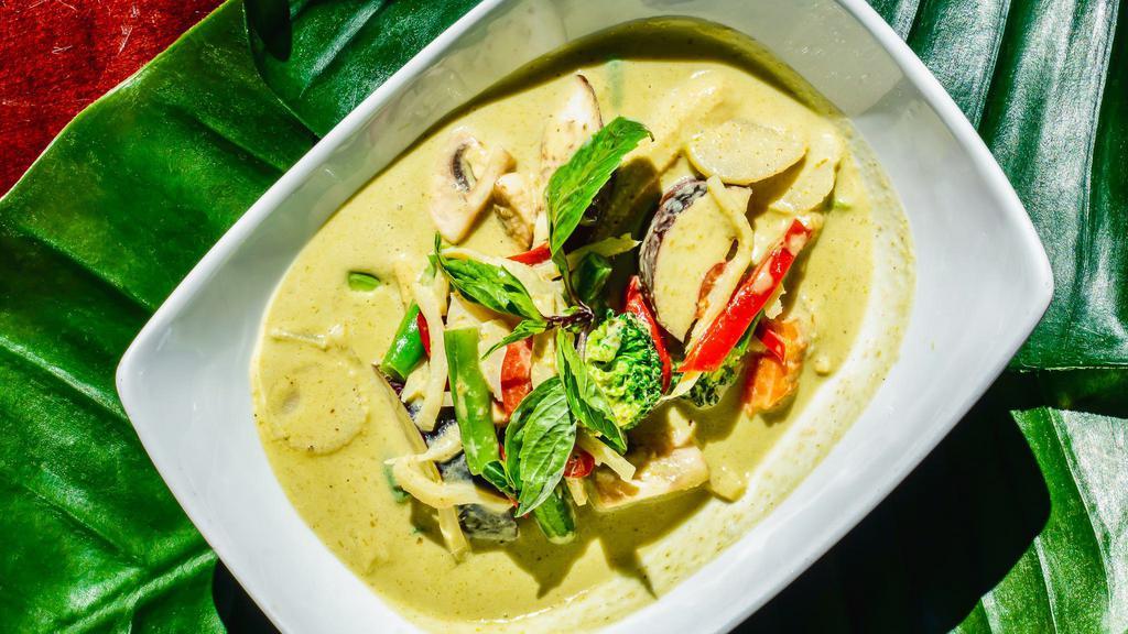 Green Curry · Spicy. Curry with green chili aroma, bamboo shoots, eggplant, basil, and bell pepper in coconut milk.