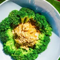 Peanut Sauce · Choice of meat, tofu, or mixed vegetables in peanut sauce served on a bed of steamed broccoli.
