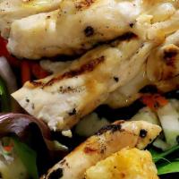 Grilled Chicken Salad · Mixed greens, carrots, grape tomatoes, olives, house made crutons