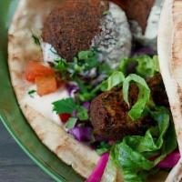 Gf Falafel Pita · Chickpea fritter, tahini sauce, mint, red cabbage, tomato, pickled turnips, lettuce, parsley...