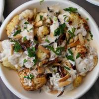 Roasted Cauliflower · lemon rind, roasted almonds, thyme,  and tahini sauce (V)(GF)(Contains Nuts)
