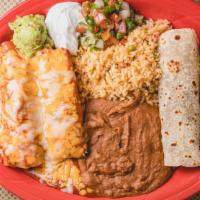 Combo Plate · One beef taco, one chicken enchilada, one tamale, served with rice and beans.