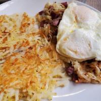 Corned Beef Hash · Steamed ground corn beef mixed with Idaho potatoes and two eggs any style.