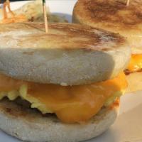 Breakfast Sliders · Two English muffins with scrambled eggs, cheddar cheese, and your choice of bacon, ham, saus...
