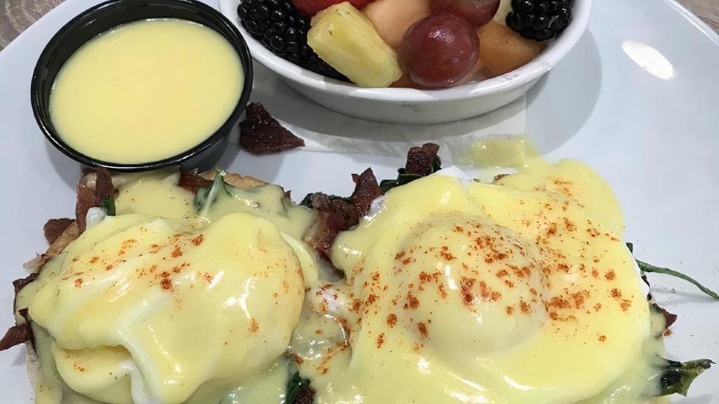 Corned Beef Benedict · Poached eggs, corn beef hash, english muffin, and chipoltle hollandaise