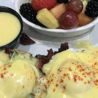 Homestyle Benedict · Oven baked biscuit, poached eggs, sausage patties, and homemade sausage gravy.