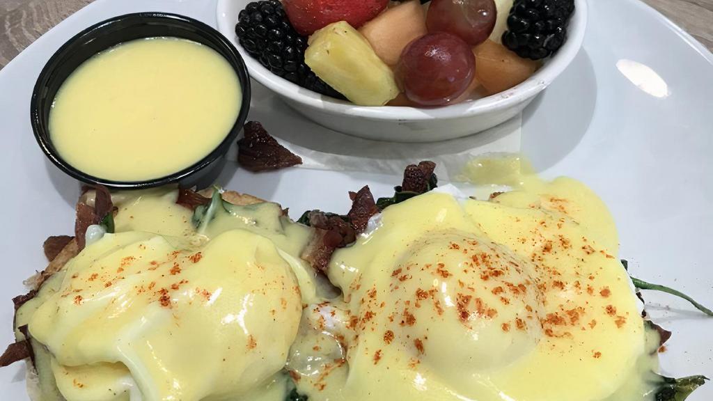 Basic Benedict · Poached eggs, ham off the bone, toasted english muffin and homemade hollandaise.