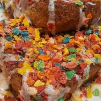 Cereal Killer French Toast · Battered in Fruity Pebbles and a vanilla frosting glaze