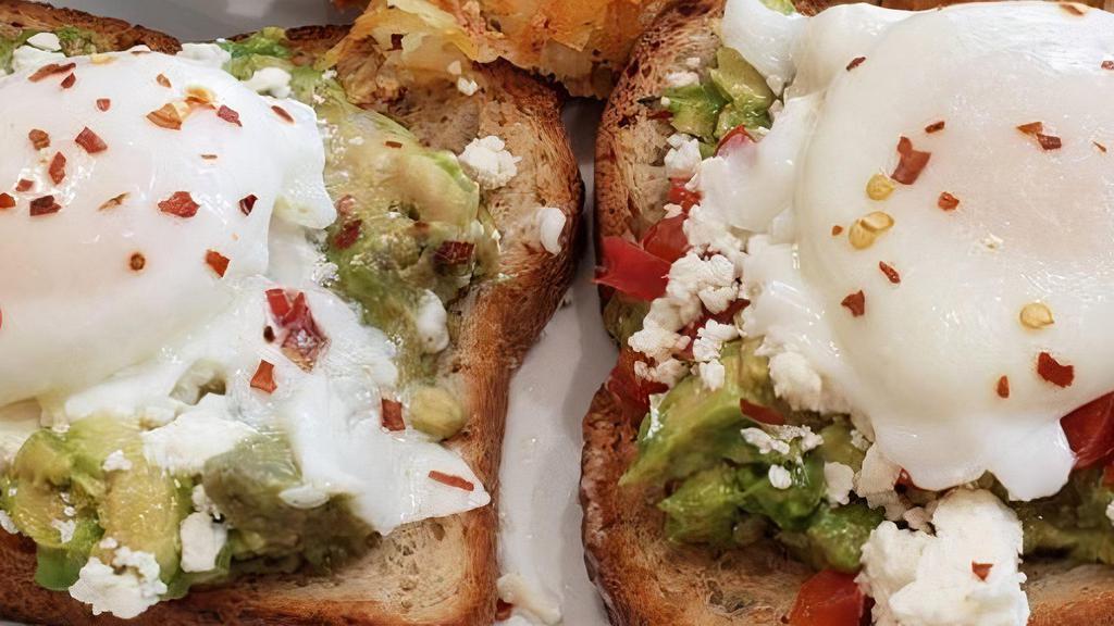 Gluten Free Avocado Toast · Multi-grain gluten-free toast,avocado red pepper spread, feta, poached eggs and crushed red peppers. Served with Fruit