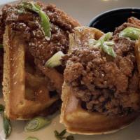 Chicken & Waffle · Golden fried chicken breast served with two Belgian waffles with bacon maple buffalo sauce a...