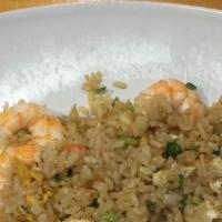 Shrimp Fried Rice · Stir fried with peas,, carrots, green and white onions.