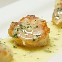 Shrimp Scuzzi’S · Lightly coated jumbo Texas gulf shrimp, garlic, parsley, lemon butter