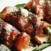 Wrapped Prosciutto · Mozzarella, Parmesan, Spinach, Reduced Balsamic
