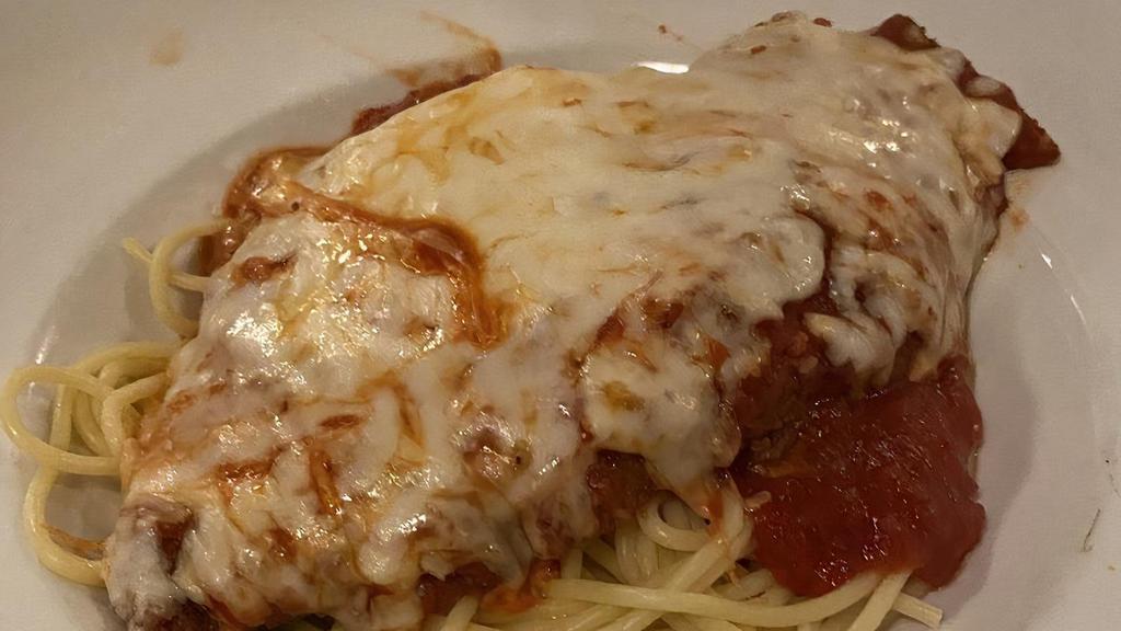Chicken Parmesan · Lightly coated with Italian bread crumb, tomato sauce, mozzarella