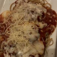Veal Parmesan · Lightly coated medallions with Italian bread crumbs, tomato sauce, mozzarella