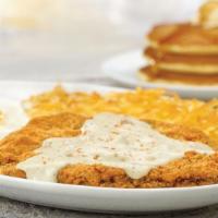 Chicken Fried Steak & Eggs · Smothered in savory country gravy.