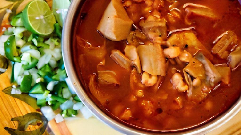 Menudo · Served with grilled bread, onions, oregano, red pepper and limes. Pancakes and hash browns not included.