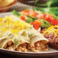 Green Chile Chicken Enchiladas · Tender chicken, sautéed onions, cheese rolled in corn tortillas topped with our signature so...