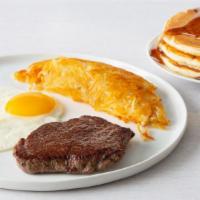 Top Sirloin & Eggs · A 8 oz. sirloin steak.
