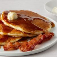 Buttermilk Pancake Combo · One egg, any style, three buttermilk pancakes with two cherrywood-smoked bacon strips or two...
